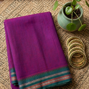 Item Code-DD13,Handloom Cotton Saree-A vibrant magenta canvas meets a classic green temple border.
